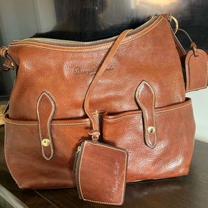 Brand new dooney & bourke hand bag brown